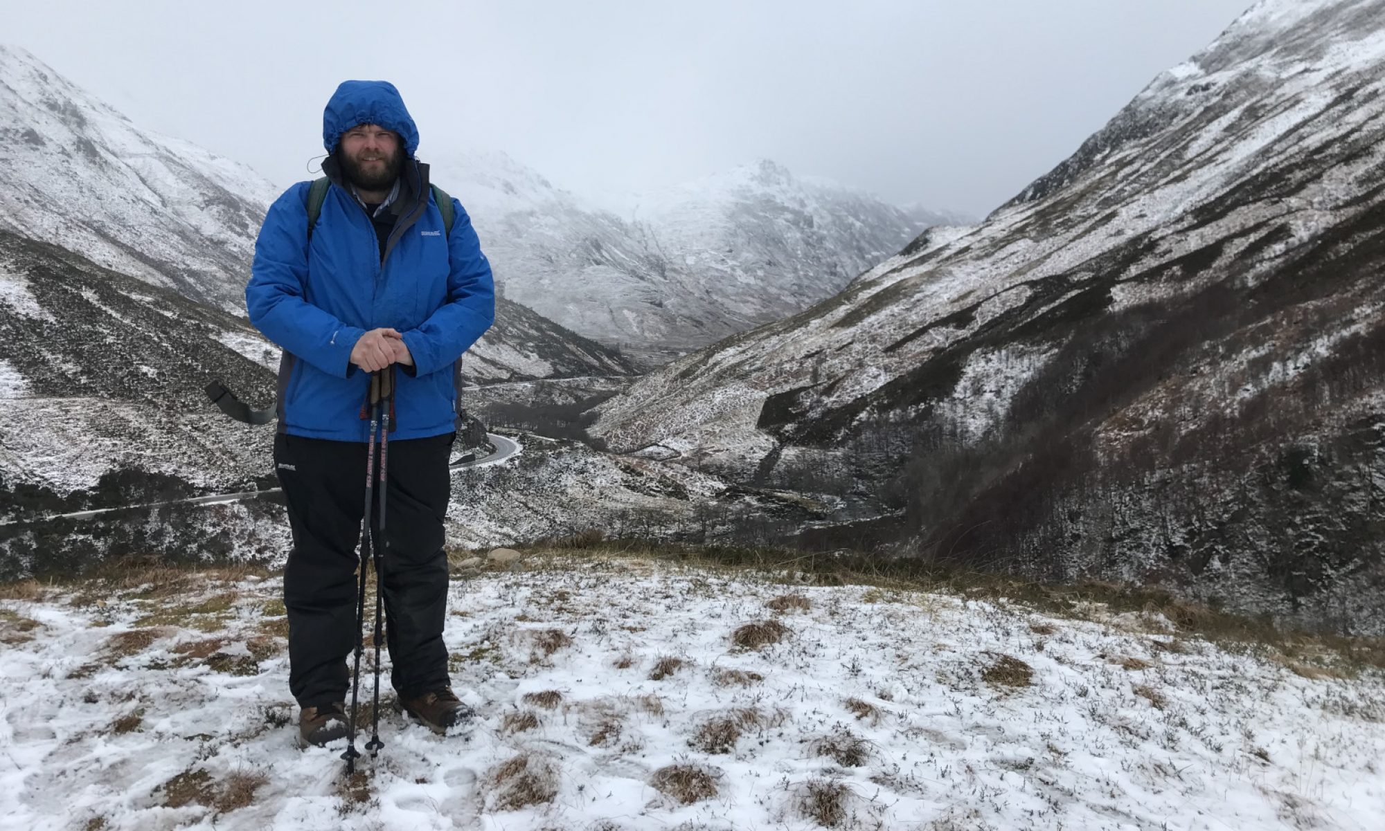Mark Standing on a snowy hill
